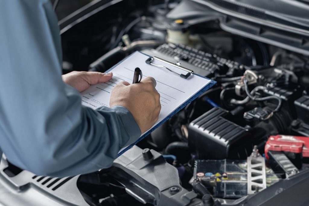 Mechanics repairing car in Jakarta